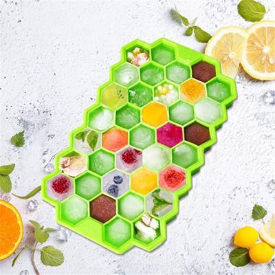 China RAYBIN High Quality Viable 37 Cavity Honeycomb Design Hexagon Ice Cube Tray with Bpa Free Silicone Lid for sale