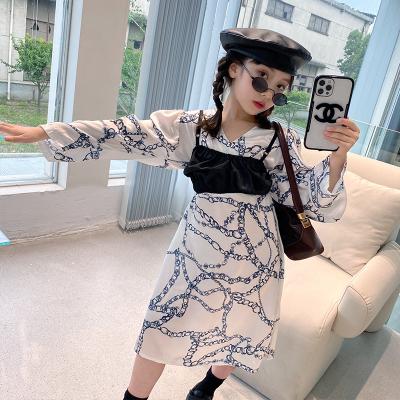 China 2021 Breathable New Fashion Kid Girl Autumn White Printed Long Sleeved Dress With Black Vest 5-10T for sale