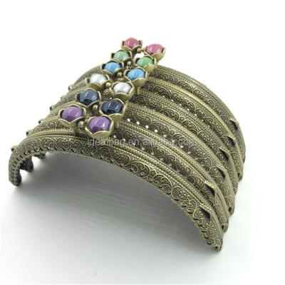 China Flower Head Purse Frame with Holes Flower Head Clutch Kiss Lock Purse Frame Metal Coin Purse High Quality for sale