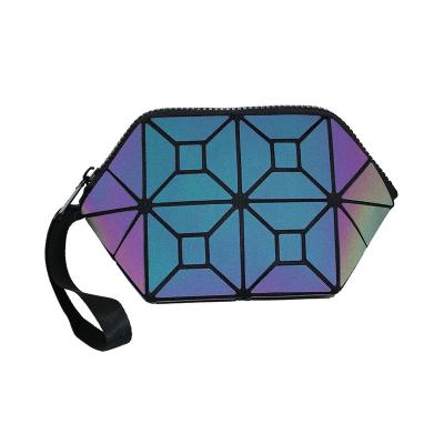 China Waterproof custom luminous cosmetic noctilucent color changing pouch vinyl geometric chameleon bag for sale