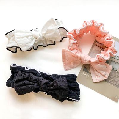 China New Design Cute Bowknot Hairband Soft Stretchy Makeup Headband For Women Spa Headband for sale