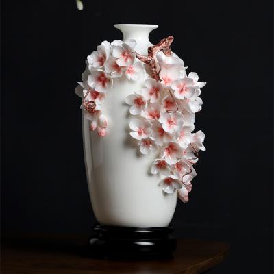 China Minimalist Classic Thin Porcelain 3D Embossment Flower Hand Kneaded Ceramic Vase for sale