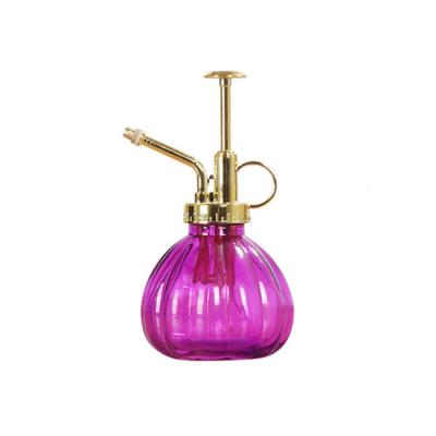 China Lightweight Luxury Colorful Garden Tool Vintage Pumpkin Glass Bottle Water Sprayer for sale