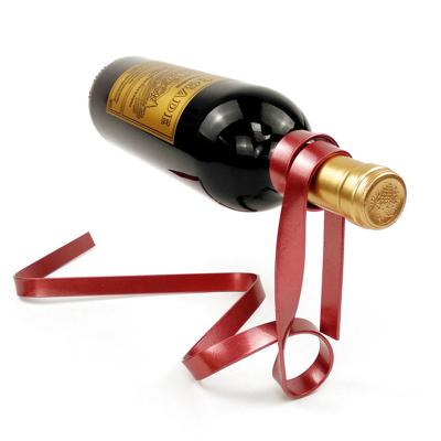 China Metal Sliver Hanging Colorful Magic Red Wine Bottle Holder Colorful Magic Metal Ribbon Suspension Red Wine Bottle Holder for sale