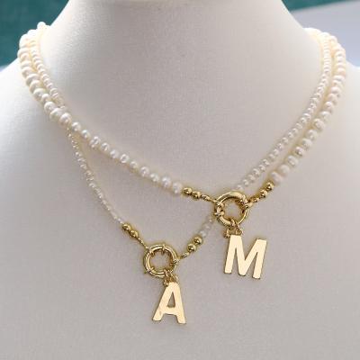 China Trendy Handmade New Design Letter Necklace Wholesale Freshwater Pearl Strand For Women Gift Letter Jewelry Making 9749 for sale