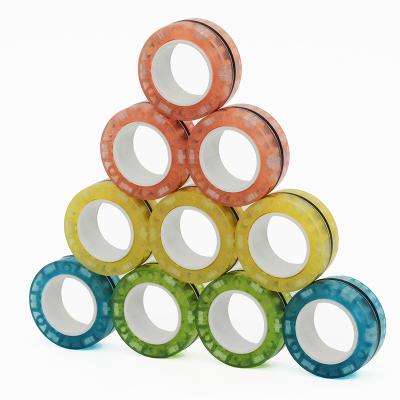 China Mini Fingertip Wheel Magnetic Fluorescent Wheel Child Instrument Plastic Color Toy Ring Finger Decompression Toy Adult Gift for sale