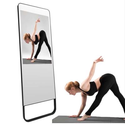 China Smart Magic Mirror Workout Touch Screen Fitness Mirror Exercise LCD Mirror Video Illuminated Magic Trainer for sale