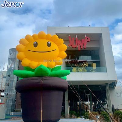 China Outdoor Decoration Inflatable Smile Sunflower Pot For Event Advertising for sale