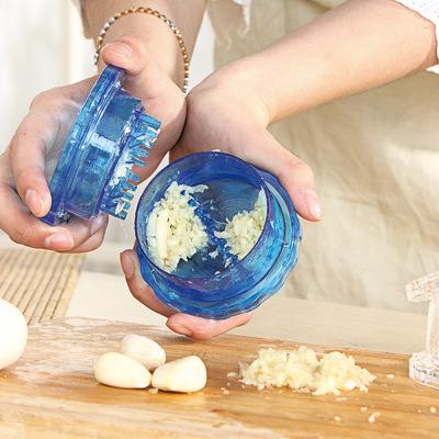 China Viable Kitchen Ginger Garlic Crusher Creative Multifunction Grinding Device Garlic Press Garlic Peeler KX 305 for sale