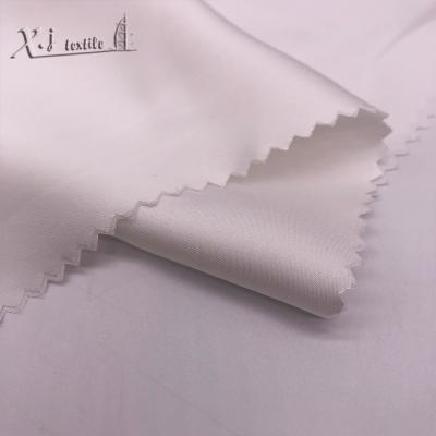 China Shrink-Resistant Eco-Friendly Fabric Half Recycled Paris Satin Fabric Satin Fabric For Woman for sale