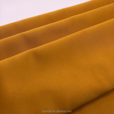 China Soft Touch Fire Retardant Silk Polyester Plain Dye Wujiang Royal Satin Fabric for sale