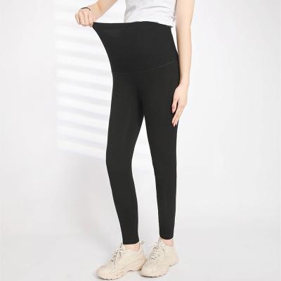 China Large size breathable pregnant women leggings 200 catties plus pregnant sportswear pregnant women wholesale yoga pants can be adjusted for sale