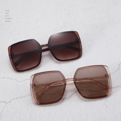 China 20 Years Experience Custom Logo 2021 New Brand Driving Unique Big Sun Oversized Black Colorful Sunglasses For Women for sale