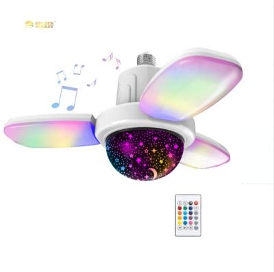 China Modern Led Tooth Speaker Bulb Deformation Music Lamp E27 3 Blue Leaves Fan Starry Sky Projector Night Light Foldable With Remote Control for sale