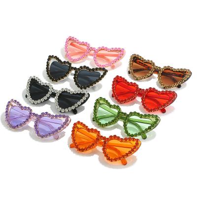 China Diamond Fashion Pink Love Heart Women's Shooting Sunglasses Street Luxury Rimless Sun Glasses With Rhinestone for sale