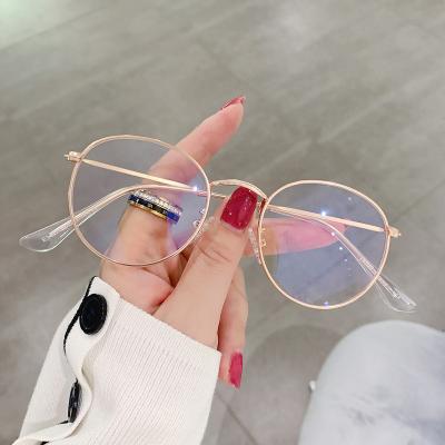 China Fashion Metal Frame Optical Glasses Frame Gold Round Women Blue Light Blocking Glasses For Men for sale