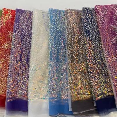 China Handmade high quality ebridal lace fabric embroidery 3d border lace hand beaded lace fabric luxury sequin for sale