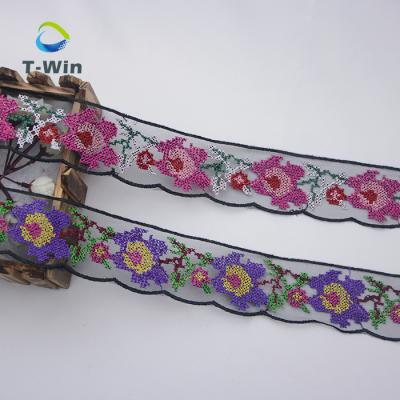 China Sustainable Wholesale Cross Stitch Supplies Polyester Mesh Lace Trim Embroidered Cross Stitch For Garment for sale