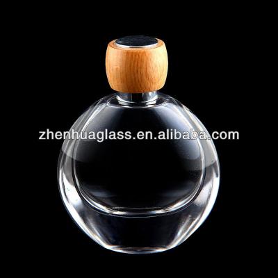 China Personal Care 50ml Perfume Glass Bottle With Wooden Cap for sale