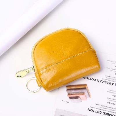 China New Design Daily Ladies Pocket Coin Purse Showcase Vegan Leather Key Chain Purses for sale