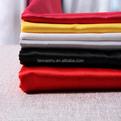 China alibaba bestsellers fire retardant shiny polyester satin fabric for dress suits for sale