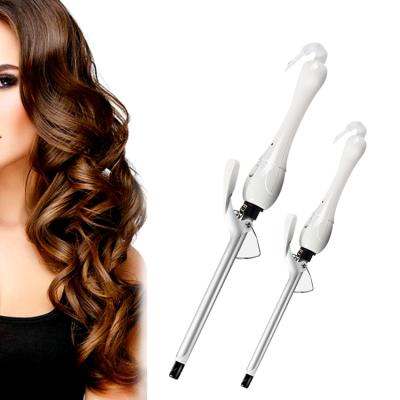 China Styling Vivid And Fashion Cordless Rotating Wave Hair Curler 310x45x46mm for sale