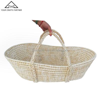 China Sustainable African Straw Woven New Born Soft Cheap Natural Handmade Baby Basket for sale