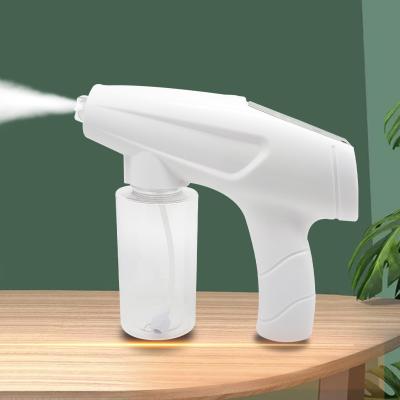 China Portable Wireless Electric Disinfecting Spray Machine Atomizer Blue Mist Ray Disinfecting Wireless Nano Sprayer Gun for sale