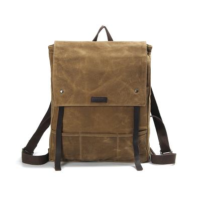 China Vintage waterproof style waxed genuine leather outdoor canvas backpack college student travel bagpack for boys for sale