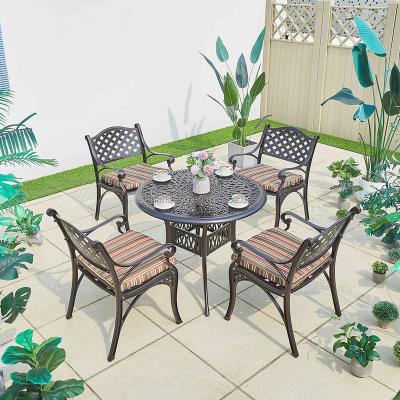 China Water Proof Furniture Cast Aluminum Comfortable Dining Table And 6 Seat Chairs Round Table Resistant for sale