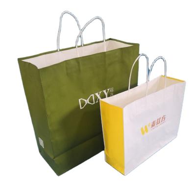 China Recyclable Custom Logo Print Wholesale Grocery White Packaging Paper Gift Bag With Handle Industrial Outer Item Packaging for sale