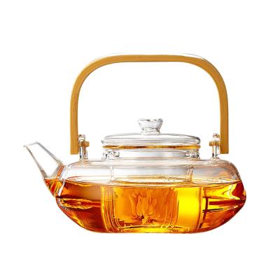 China Large size sustainable gongfu glass teapot with bamboo wooden handle for sale