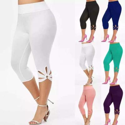 China Plus size plus size new milk silk women's pants seven point yoga leggings running female fitness sports pants for sale