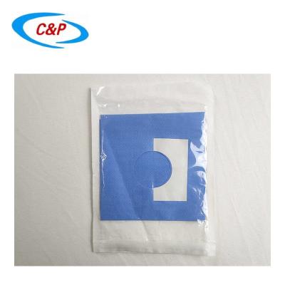 China Disposable Sterile Surgical Drapes Adhesive Fenestrated Drape With Hole for sale