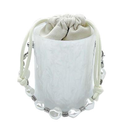 China Hot Fashionable INS Barrel-Shaped Pearl Mini Summer Drawstring Bags Ladies Luxury Women Handbags Ink Style Evening Clips For Female for sale