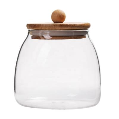 China Sustainable Wholesale Hand Blown Clear With Bamboo Lid Sealed Food Storage Container Glass Jar for sale