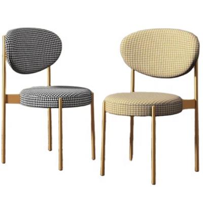 China Foshan Factory Adjustable (Height) Metal Legs Gold Fabric Upholstered Dining Chair for sale