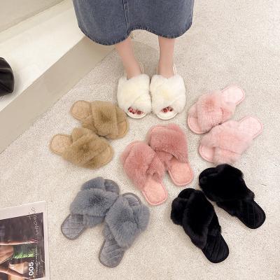 China Fashion Trend Autumn Winter New Slippers Use Fashion Home Indoor Flat Fuzzy Cross Slippers Fuzzy Slippers for sale