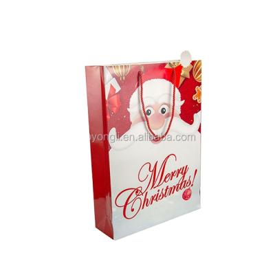 China Recyclable Eco - Friendly Custom Christmas Printing Recyclable Gift Packaging Paper Shopping Bag With Handle for sale