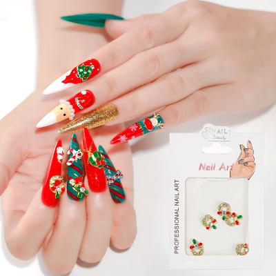 China Hot Sale Nail Salon Beauty 5pcs/bag Bulk Christmas Jewelry Snowman Nail Stickers Diamond Christmas Series Alloy Nail Art Decoration for sale