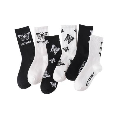 China Antibacterial ladies mid-tube socks autumn and winter cotton butterfly Japan Central Institute of Statistics jars hip-hop skateboard socks factory direct wholesale for sale