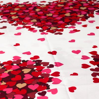 China Antistatic Home Textile 55-150 Gsm Red Heart Printed Microfiber Brushed Fabric 100% Polyester Printed Fabric for sale