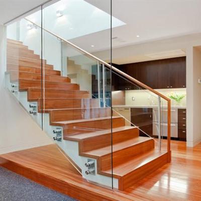 China Quality Modern Durable Interior Frameless Standoff Glass Railing With 12mm Laminated Tempered Glass Panels for sale