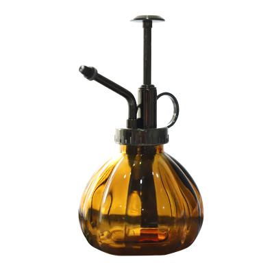 China Easily Assembled Colored Vintage Glass Spray Bottle For Garden Plant Press Water Pot for sale