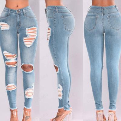 China Others high-waisted elastic butt-lifting feet with holes in women's casual pencil jeans ripped slim fit denim jeans for sale