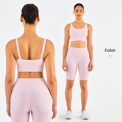 China Hot Selling Breathable 2 Pieces Gym Sets Yoga Ribbed Sexy Girls Bra Fitness Gaiters Short Pants for sale