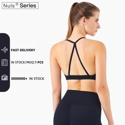 China Hot Selling Sexy Breathable Spaghetti Strap Women Sports Bra Halter Buttery Soft Pads Gym Top for sale