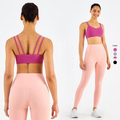 China New Breathable 2 Pcs Gym Fitness Sets Candy Silk Feels Padded Sports Bra Yoga Pants Gaiters for sale