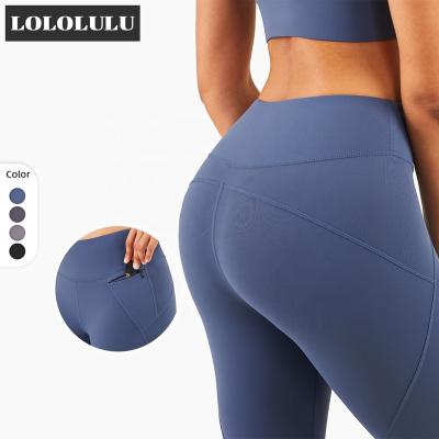 China Breathable tiktok butt crack! crack! wholesale Front Zipper Pocket Yoga Pants Gym Gaiters Gaiters for sale