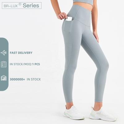 China Breathable Drop Shipping High Waist Yoga Gaiters With Pockets Women Solid Color Workout Pants for sale